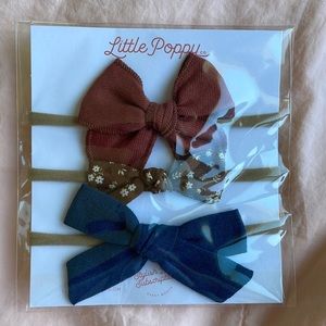 Brand new in package! Little poppy soft baby headbands